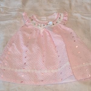 Pink baby dress.